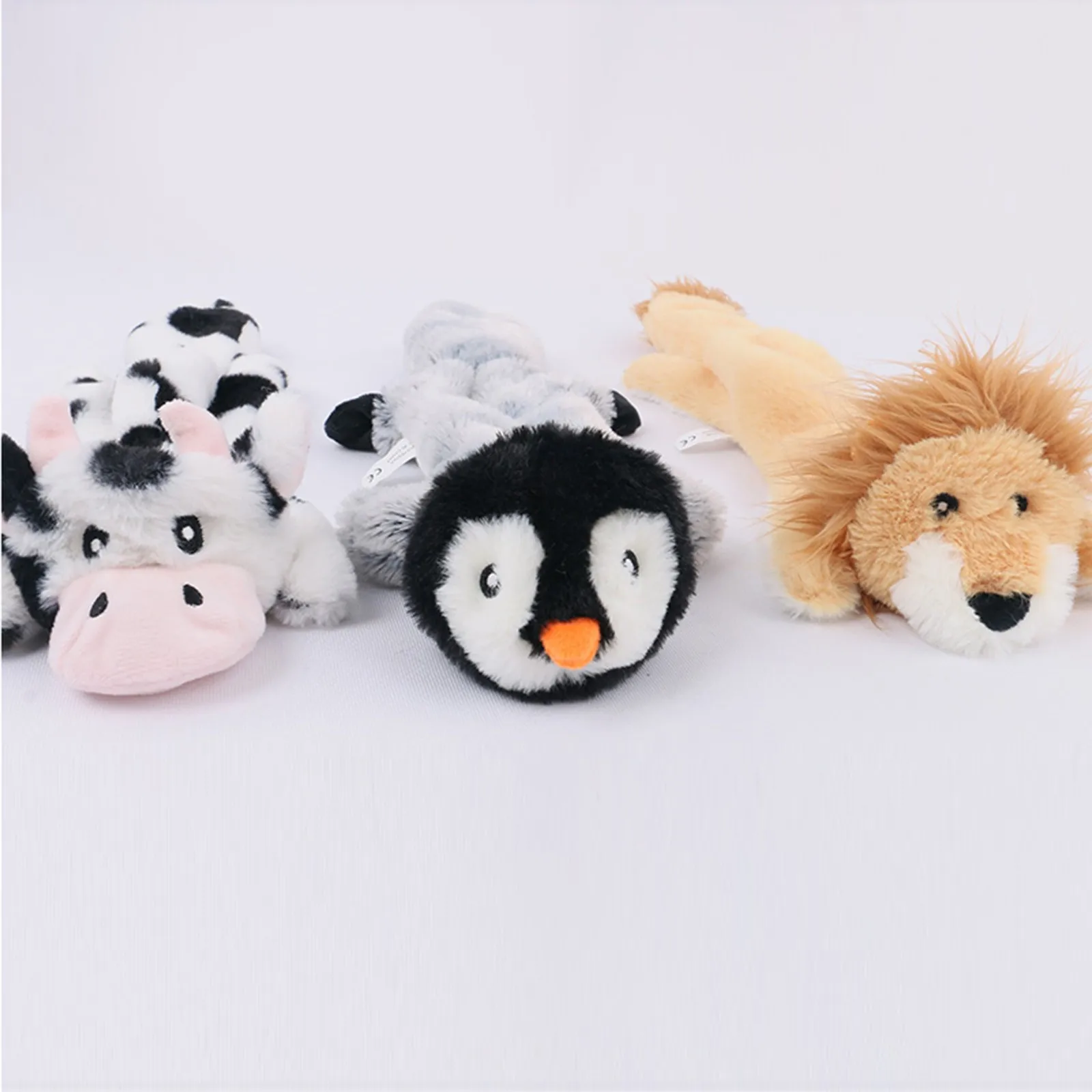 

Skinny Peltz Unstuffed Squeaky Plush Durable Dog Toys, Milk, Lion, Penguin