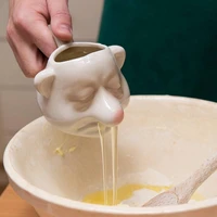 funny egg separator tool egg white separator kitchen practical gadget cute ceramic human head big nose shape