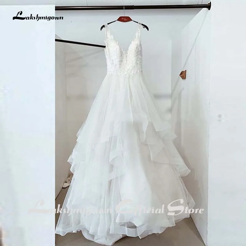 

2020 V-neck Wedding Dress Sleeveless Tiered Skirt White Ivory Ruffles vestidos de novia Backless Sweep Train abiti da sposa