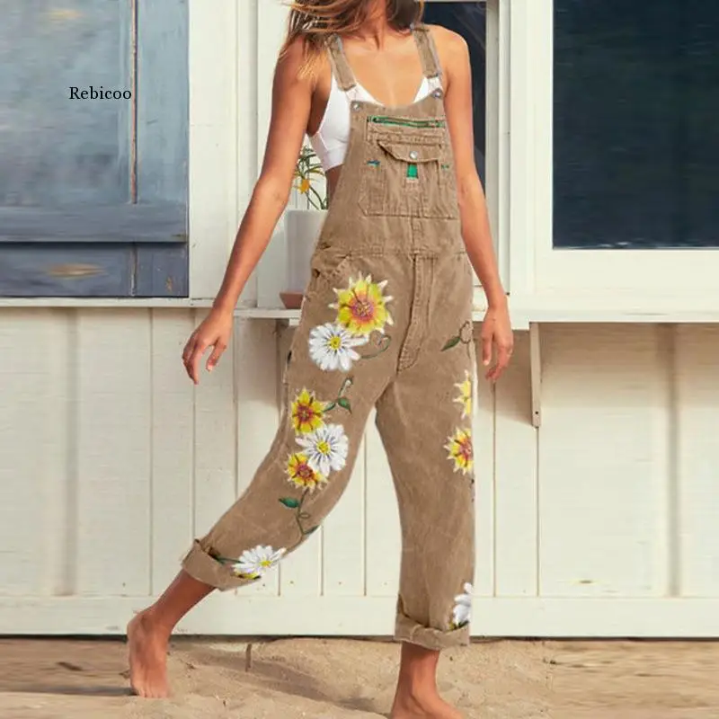 Женский джинсовый комбинезон с длинными брюками и принтом на бретелях весенний