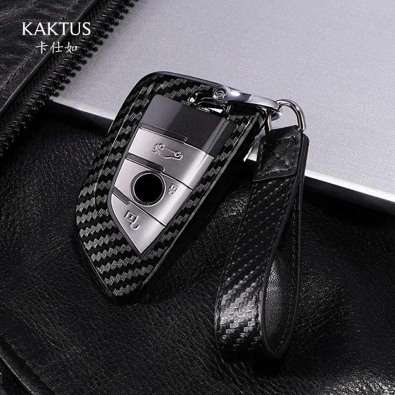 

Жесткий Чехол для автомобильного ключа с узором из 2021 углеродного волокна, кошелек, цепочка для ключей для BMW 2018, 5, 7, серия ключей X1, X3, X5, чехо...