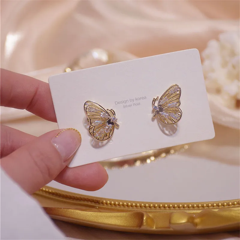 

Роскошные S925 наборе серебристых спиц из бабочка блестящая с украшением в виде кристаллов циркон серьги-гвоздики для женщин темперамент гип...