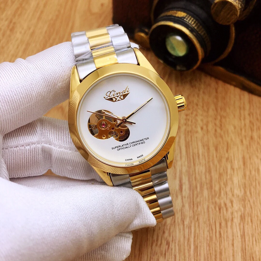 

Hot sale in gold style, simple round hollow men's mechanical watch with solid steel band 2021 new casual fashion business