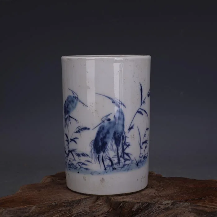 

Old blue and white water bottle, Heron roost illustration