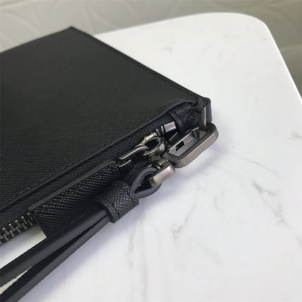 

New leather men and women large-capacity fashion handbag messenger bag clutch