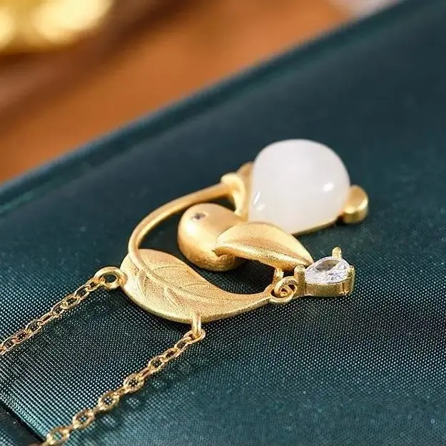 

Natural Hetian Jade Golden Branch Jade Hare Zodiac Rabbit Pendant S925 Sterling Silver Pendant Gold Plated White Jade Hare Clav