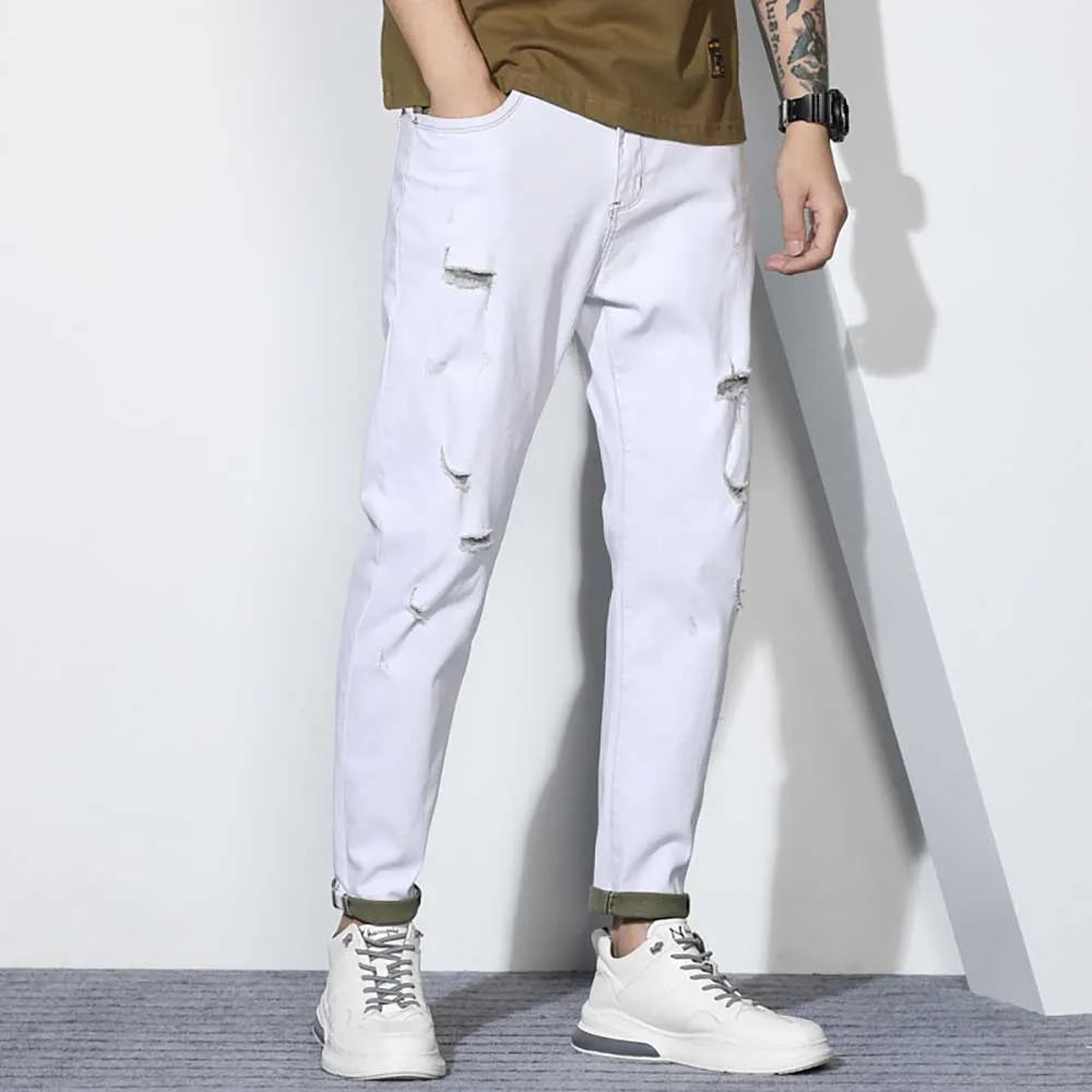 Модные белые рваные джинсы Мужские обтягивающие джинсовые штаны облегающие