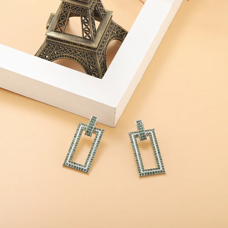 

Korean version of Korean jewelry personality fashion simple temperament cold wind earrings female exquisite full diamond rectang