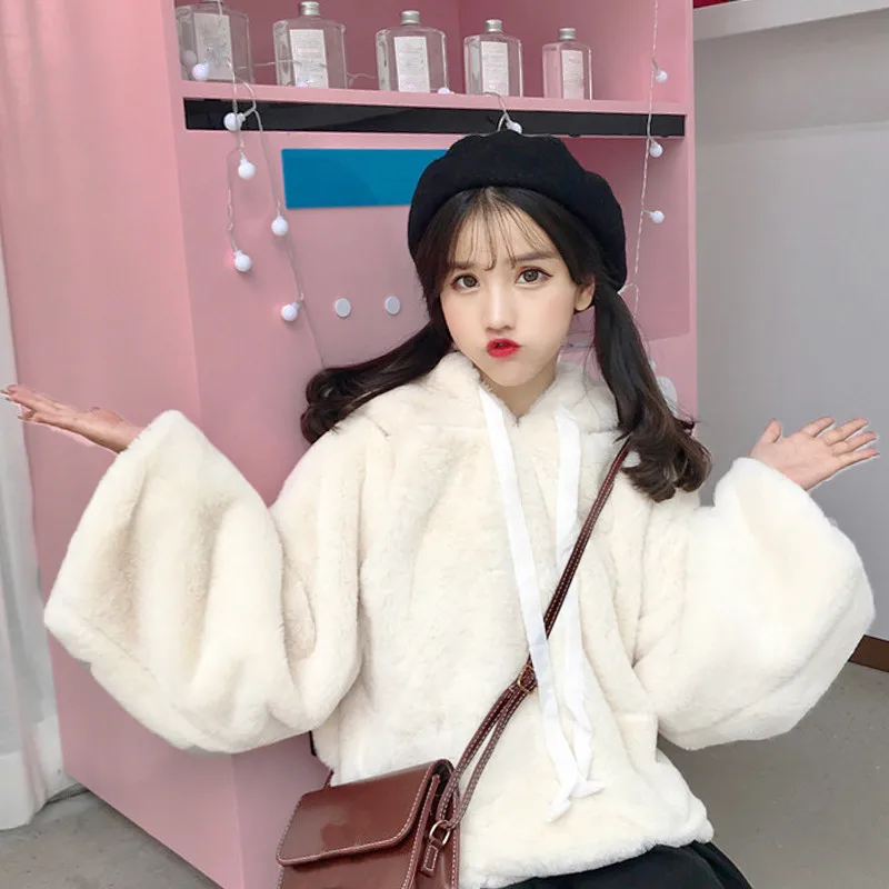 Женская флисовая толстовка с капюшоном однотонная теплая расклешенным рукавом в