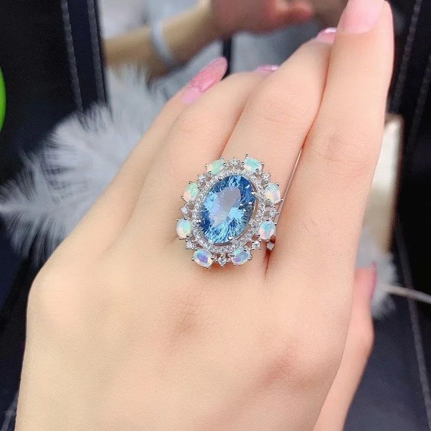 Кольцо из серебра 100% пробы с натуральным голубым топазом опалом