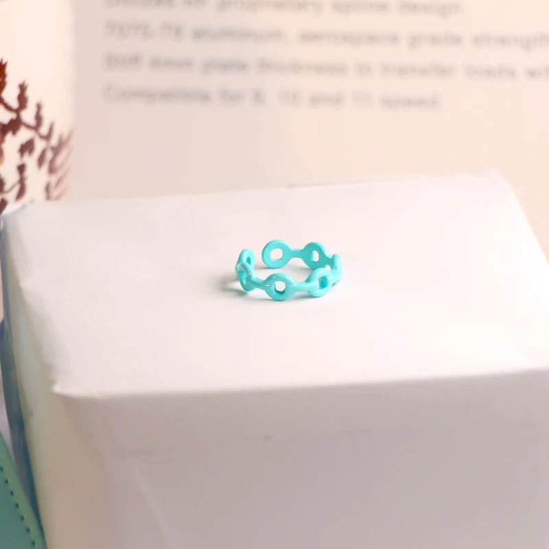 

2021 New fashion personality cute lady irregular hollow opening candy ring geometric hand-painted party round candy ring