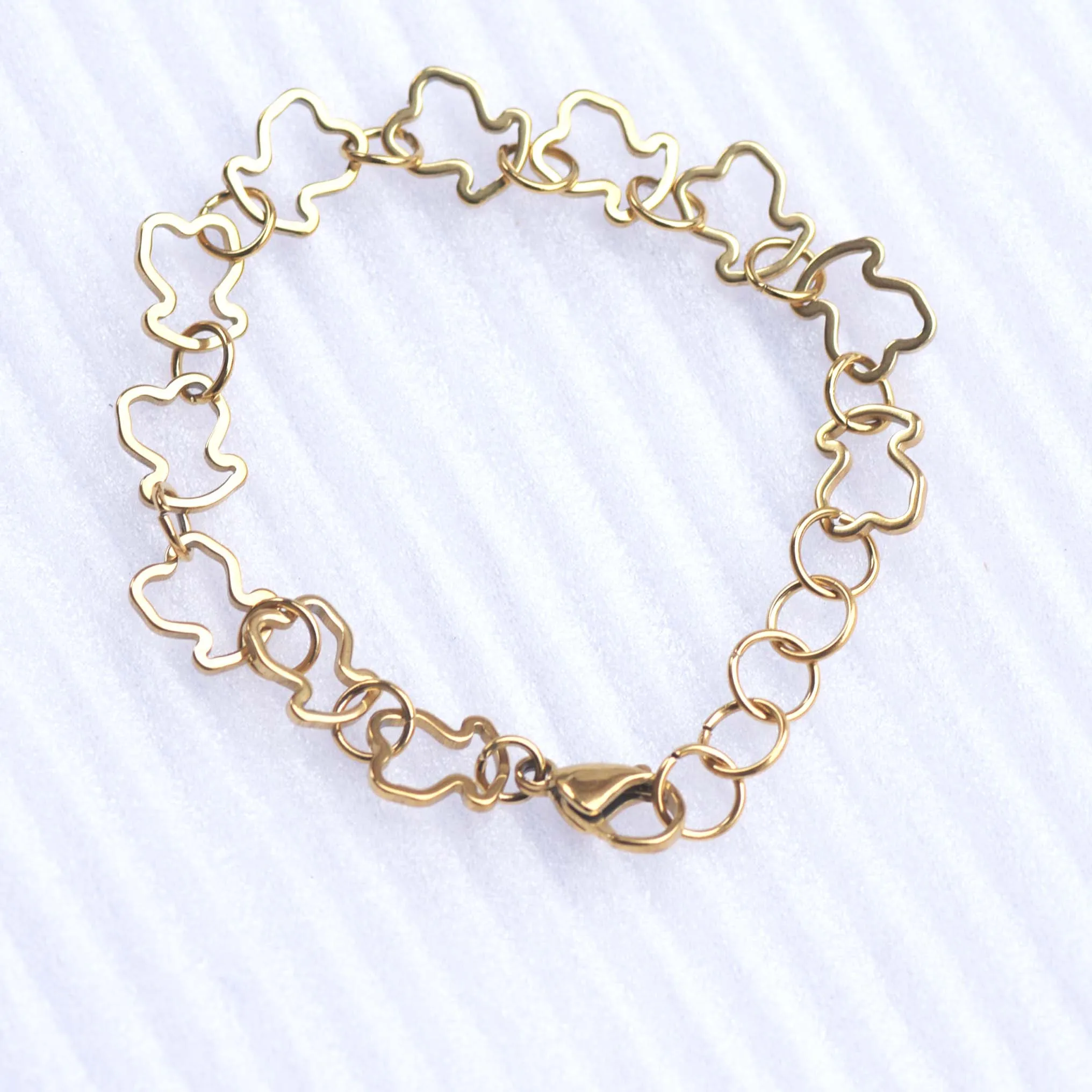 

Hollow bear stainless steel thick bracelet color simple bear bracelet multiple bear buckle bracelet