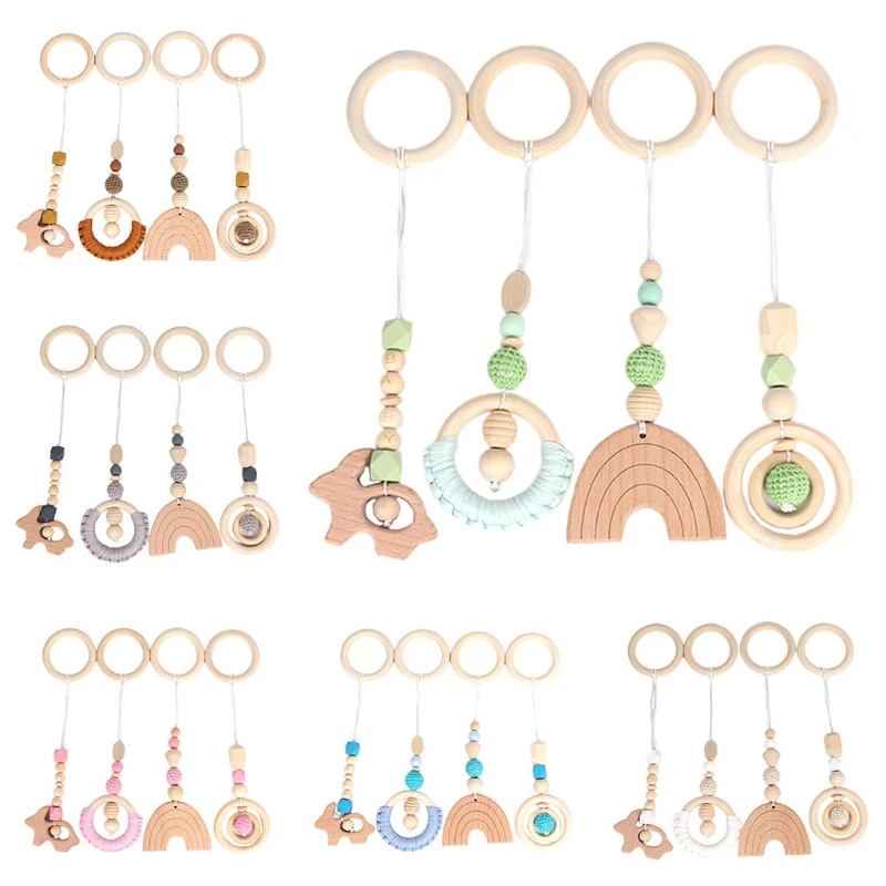 

4 Pcs/Set Baby Teething Nursing Rattle Toys Gifts Play Gym Frame Stroller Hanging Pendants Wooden Ring Teether Molar