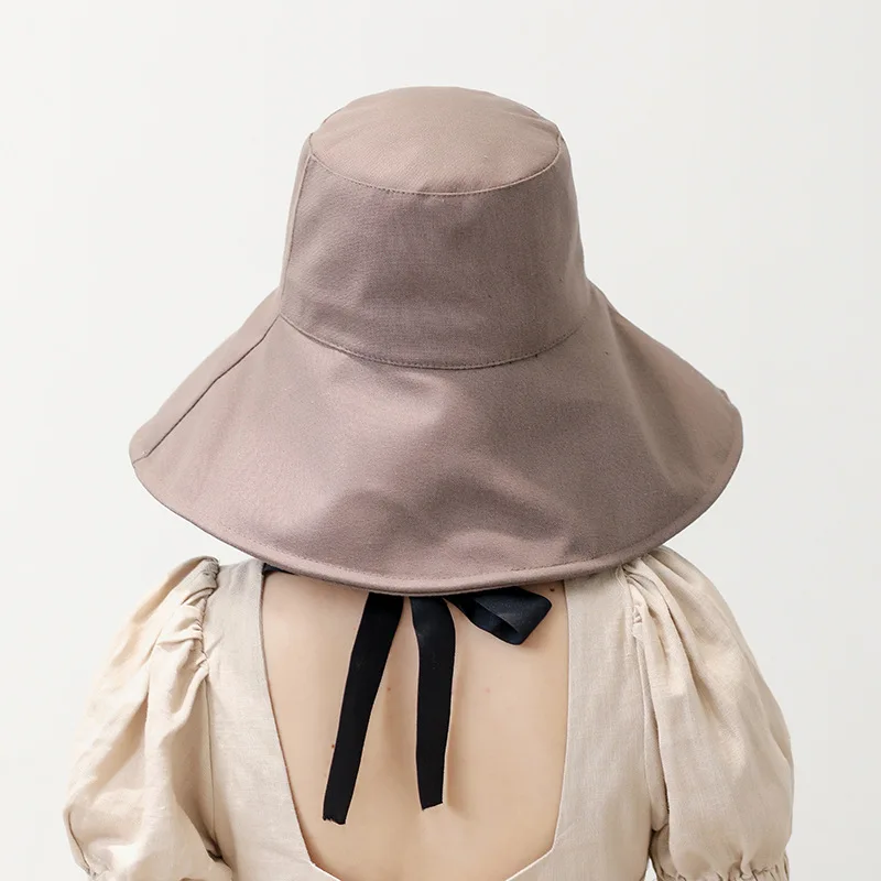 New casual big brim sun protection UV hat Women's bow tie Japanese wild fisherman hat