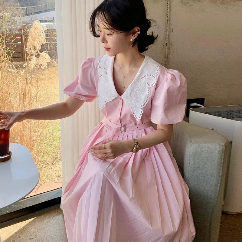 

Korean Chic Soft and Sweet Lace Hook Flower Baby Collar Single Breasted Lace Up Gathered Waist Bubble Sleeve Pleated Dress