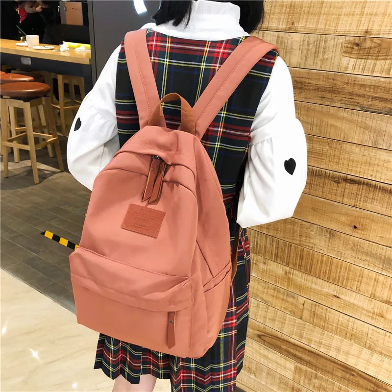 

New backpack female Korean version simple solid color small fresh Harajuku student schoolbag large capacity girlfriends Backpack