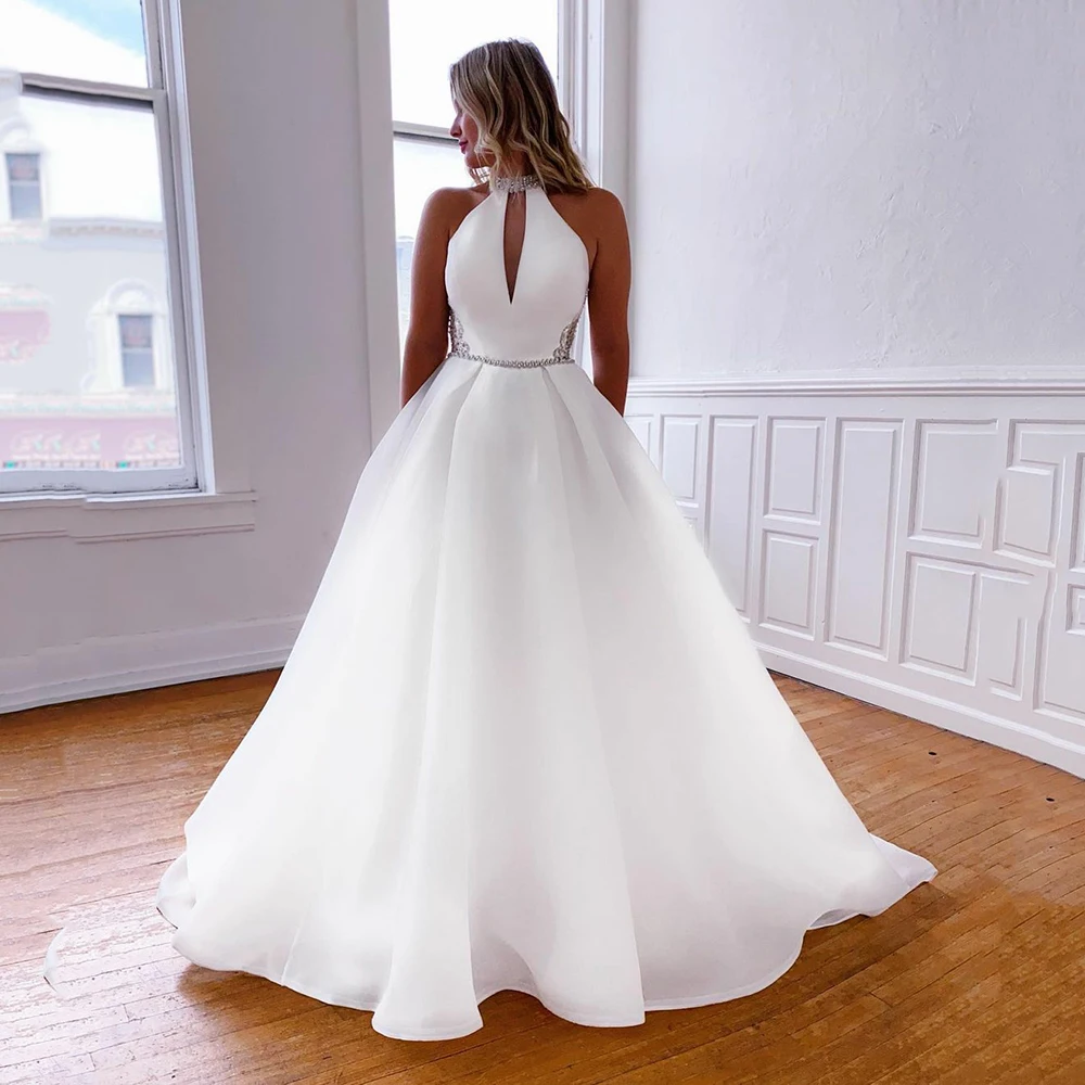 

Платье Свадебное ТРАПЕЦИЕВИДНОЕ из атласа и органзы, с карманами, с открытой спиной, на бретелях-спагетти, блестящее