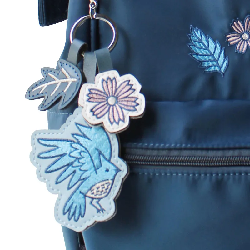 

other side 2021 spring new backpack leisure literature embroidery nylon cloth schoolbag