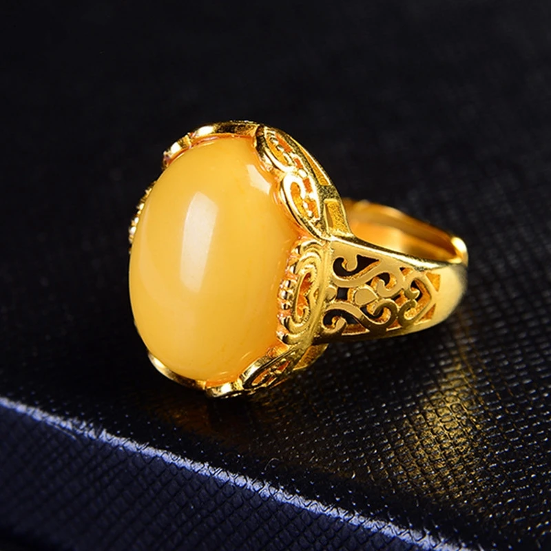 

Retro ethnic style beeswax ring female models with natural honey chicken oil yellow old beeswax amber ring simple jewelry