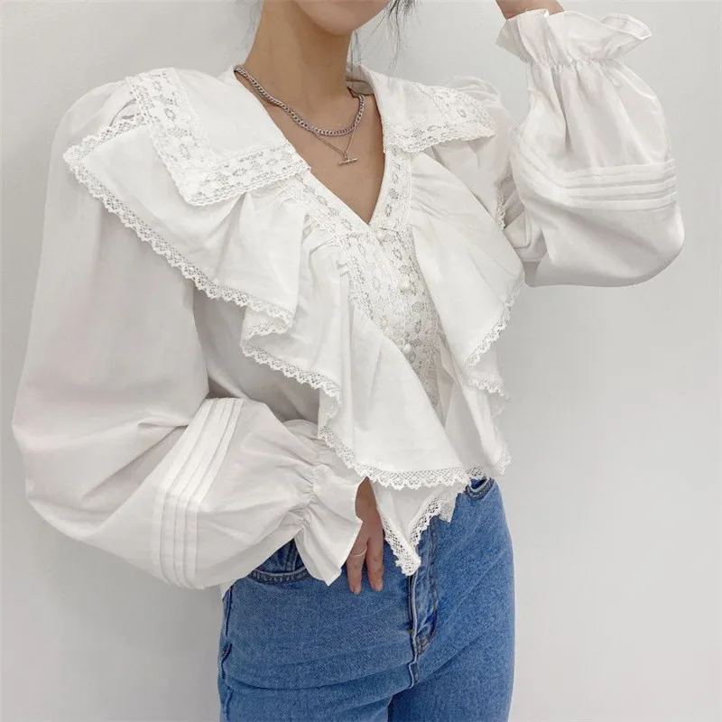 

RUGOD 2021 doll collar flared sleeve ruffle stitching fashion shirt
