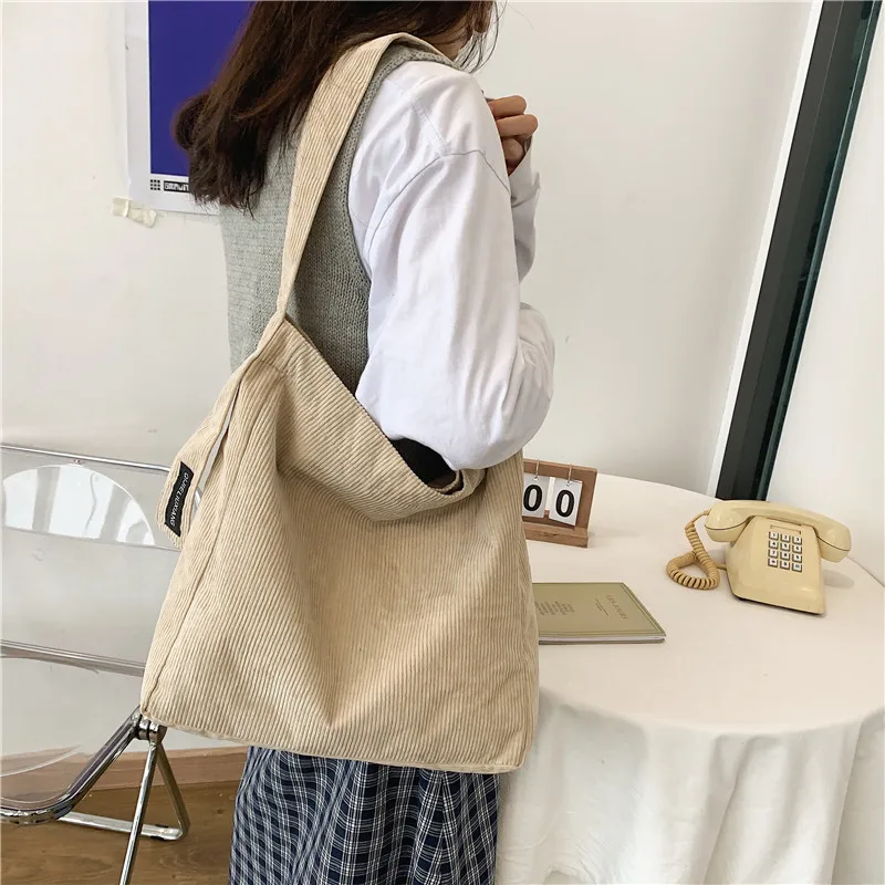 

Retro corduroy canvas bag 2021 new large capacity lazy wind one shoulder Backpack Tote Bag student class bag