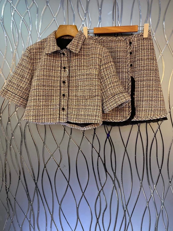

2021 new women fashion lapel symmetrical pocket woolen material long-sleeved short jacket + half skirt suit 807