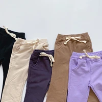 childrens spring new casual pants girls simple solid color elastic waist lace up cotton sweater flared pants