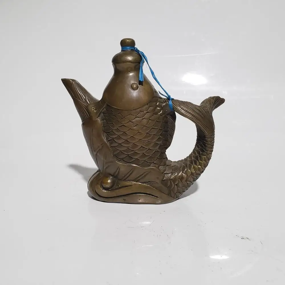 

Exquisite brass carp Teapot ornaments