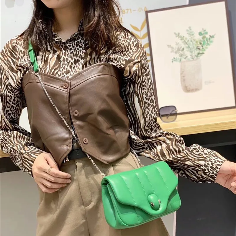 

2021 new star fashion same snakehead chest bag single shoulder cross arm portable chain leather waist bag hand held women's bag