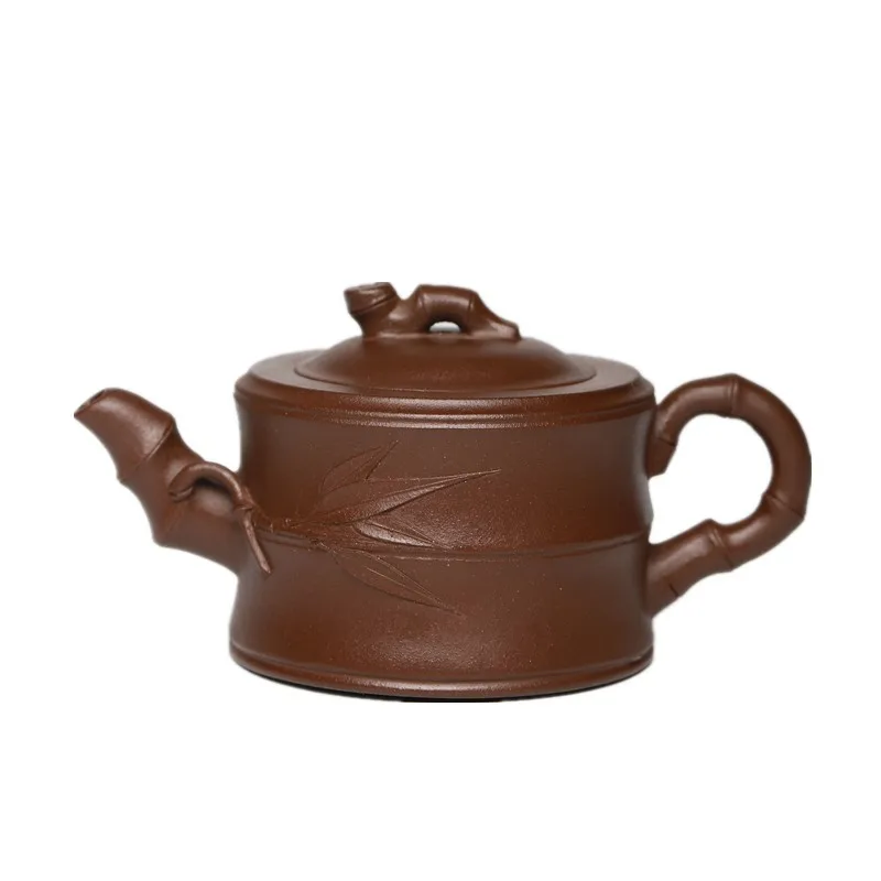 

Yixing purple clay teapot with bamboo leaf and bamboo section