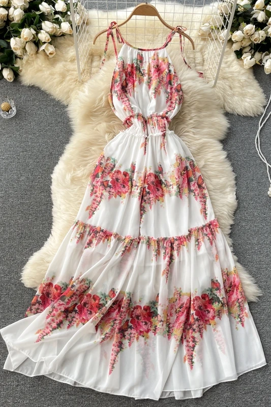 

Ladies dress noble and elegant temperament women's 2021 new heavy industry printing scheming hanging neck strap holiday skirt