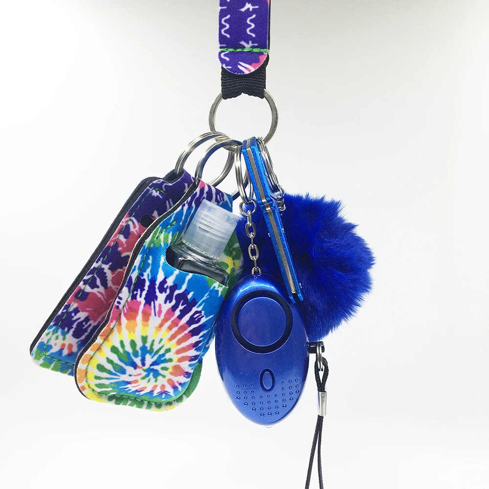 

Safety Keychain for Women Set with Alarm Pom Pom Wristlet Keychain Bottle Opene Lip Balm Holder Hand Wash Holder