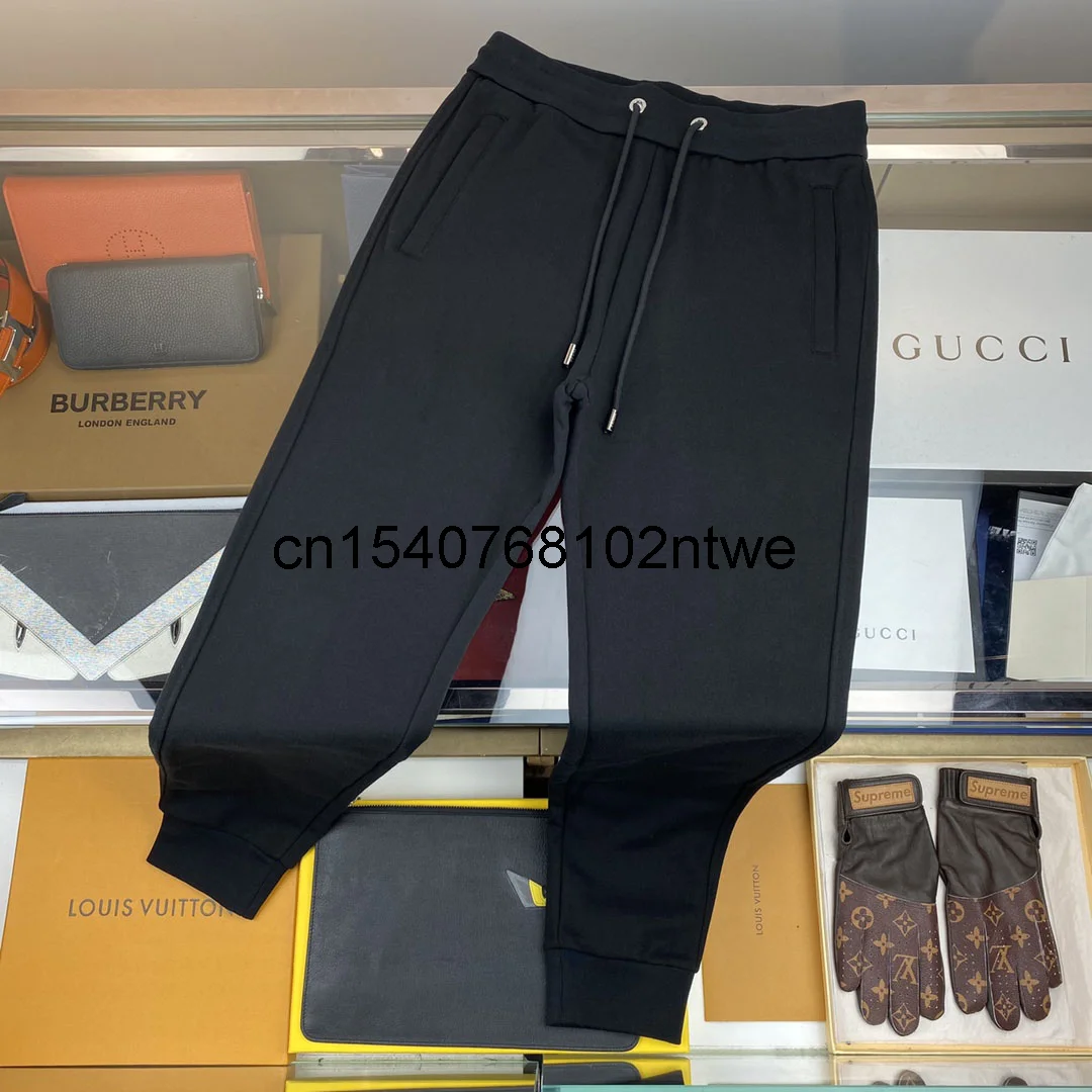 

Men's Trousers 2021 Autumn New Solid Color Zipper Pocket Decoration Mid-Waist Cotton Jogging Pants Couple Guard Pants