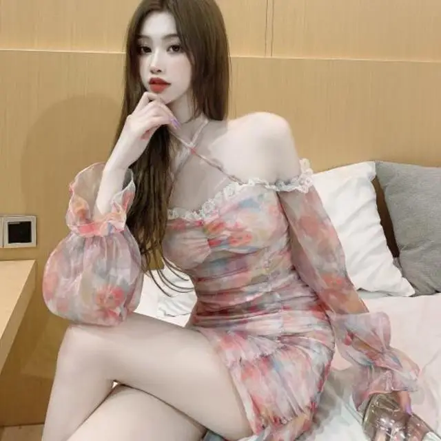 

One line collar new 2021 student buttocks bubble ink printing skirt long sleeve dress slim sexy skirt