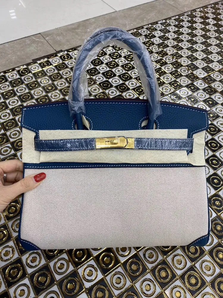 

Canvas stitching with cowhide fashion buckle bag Portable Single Shoulder Messenger Bag