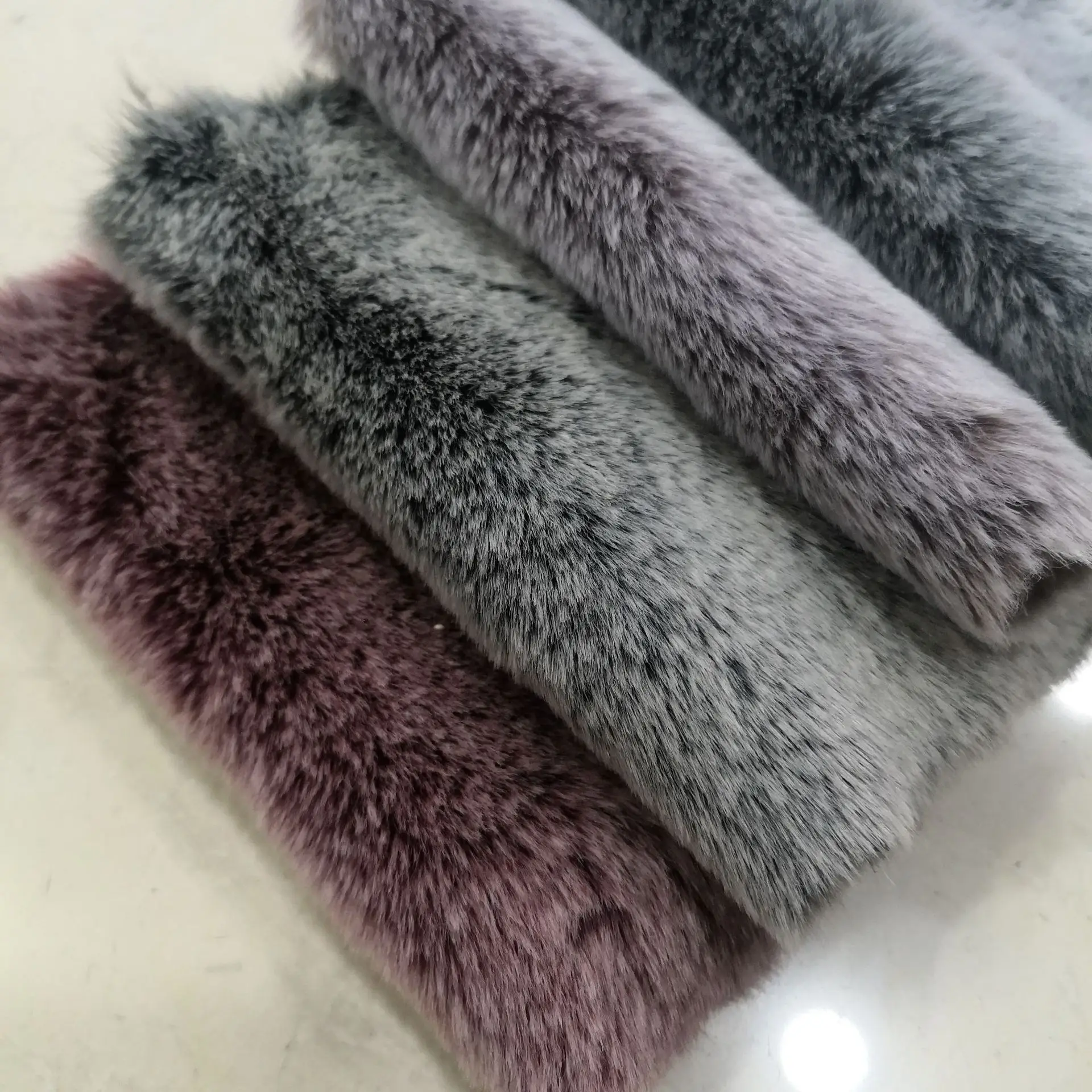 

Faux Fur Fabric Faded Rabbit Fur Thickened Two-color Engraved Faux Fur Fabric For Clothing Bags Shoes and Hats
