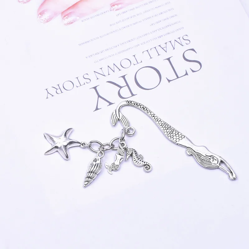 

Retro Alloy Wing Bells Bookmark Charms Sea Shell Mermain Pendant Keychain Binder Index Divider For Reader Lovers Gift Jewelry