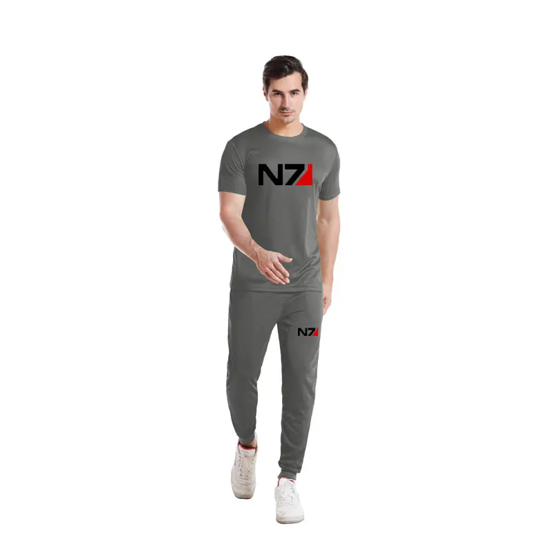 

The New Summer Fashion Print Short-sleeved T-shirt + Casual Pants Loose Breathable Sweat Absorbing Men's Sports Suit