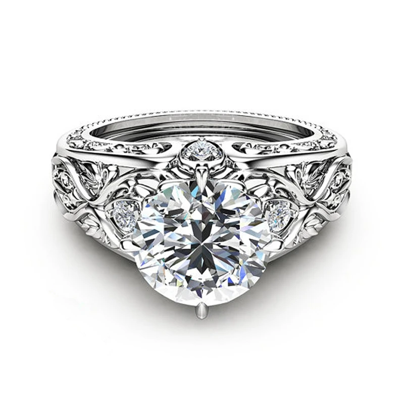 Кольцо женское из серебра 925 пробы с круглым цирконием и драгоценными