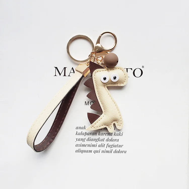

Cute Little Dinosaur Keychains Leather Cartoon Dinosaur Key Chain Pendant For Boy Bag Key Chain Gifts Bag Pendant