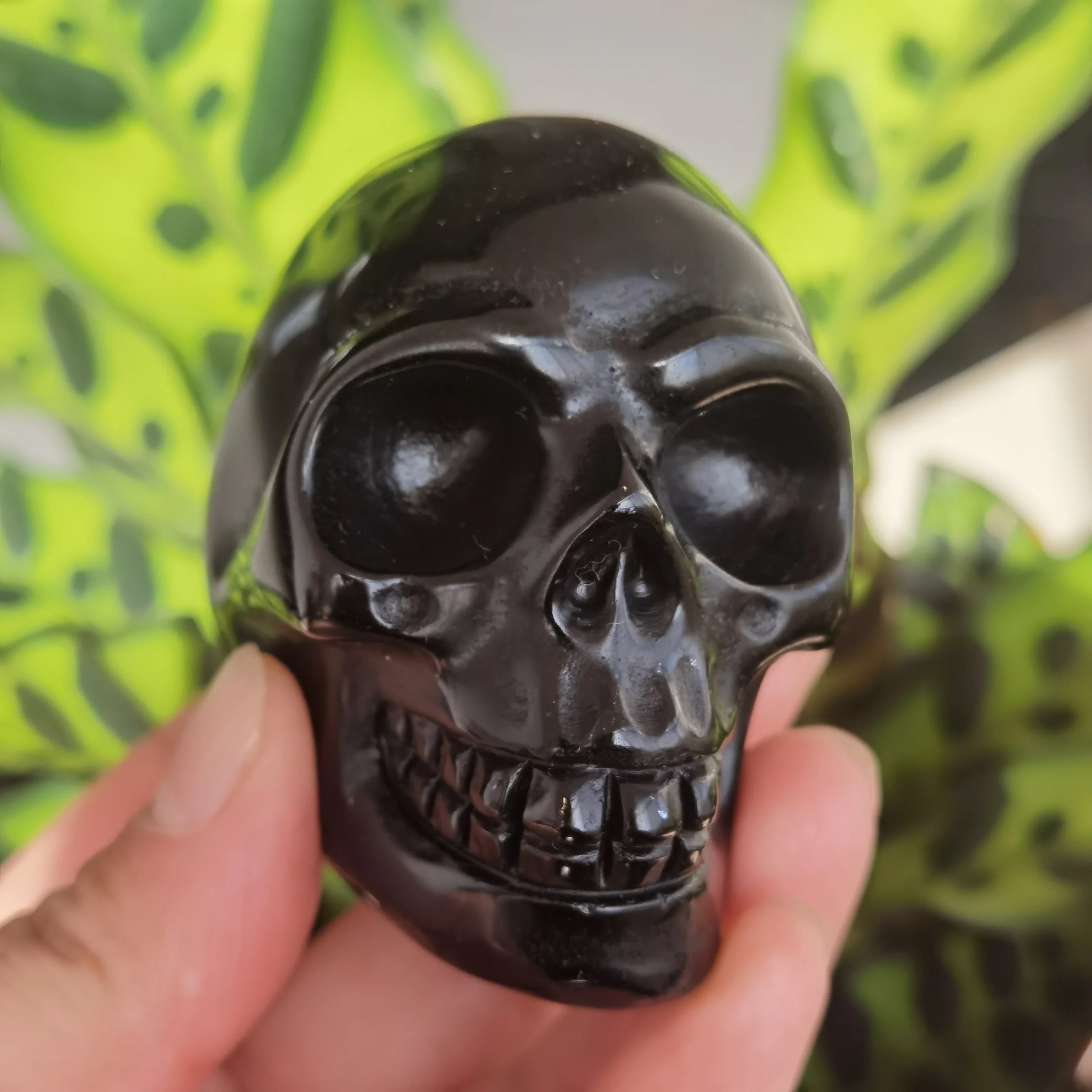 

Natural obsidian quartz skull is hand carved crystal therapy Specimen Healing Stone