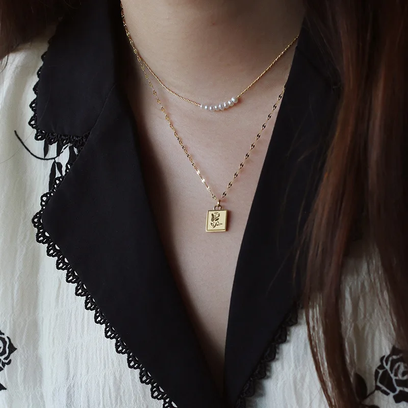 

Stainless Steel Gold Mini Square Plate Embossing Rose Flower Romantic Freshwater Pearl Smile Necklaces For Ladies