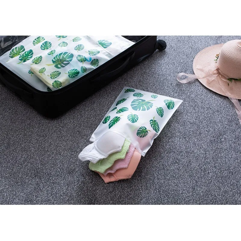 

1PC Leaf Printing Transparent Eva Travel Storage Bag Waterproof Seal Up Bag Travel Luggage Clothes Arrangement Bag organizer