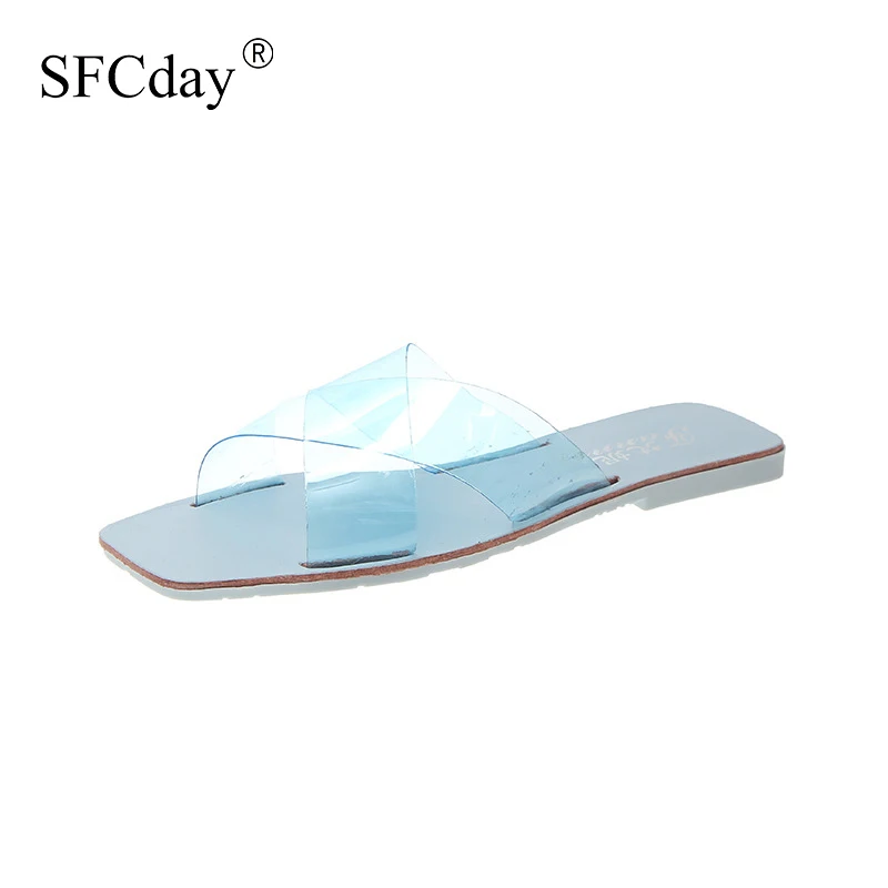 Женские шлепанцы на плоской подошве с перекрестными ремешками прозрачные мягкие