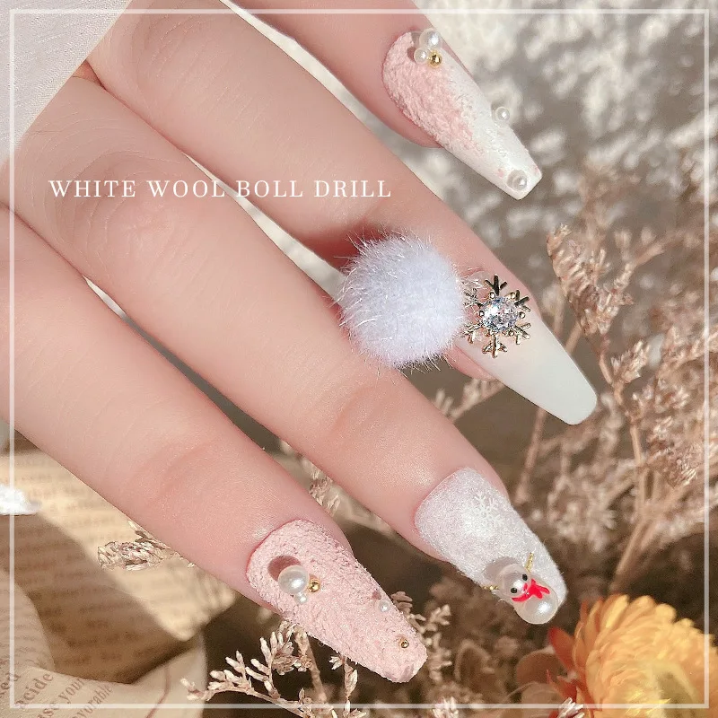 

Наклейка для ногтей в виде снежинки и банта