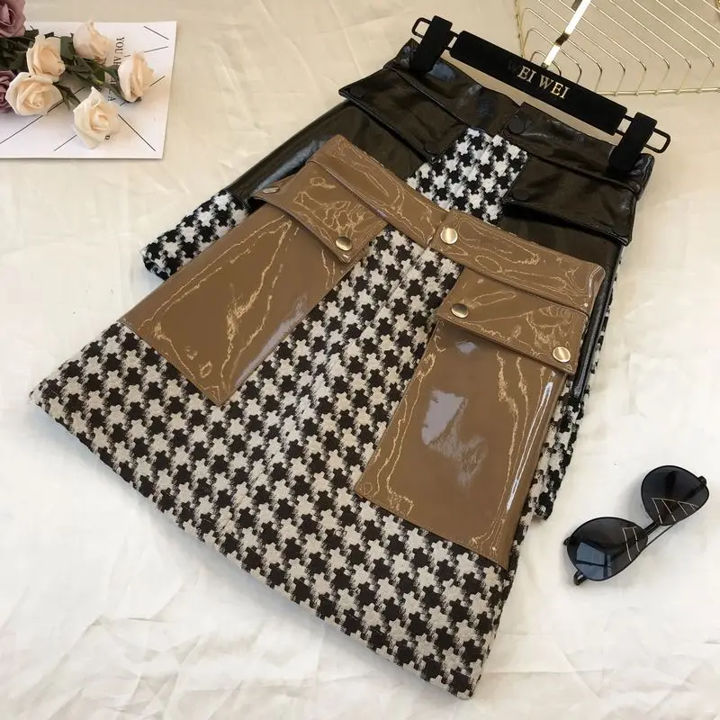 Женская шерстяная юбка с карманами короткая А-силуэта из искусственной кожи