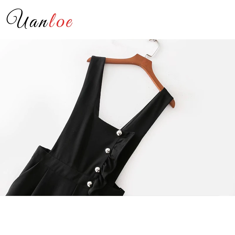 Женский винтажный комбинезон на пуговицах черный с рюшами и декоративными