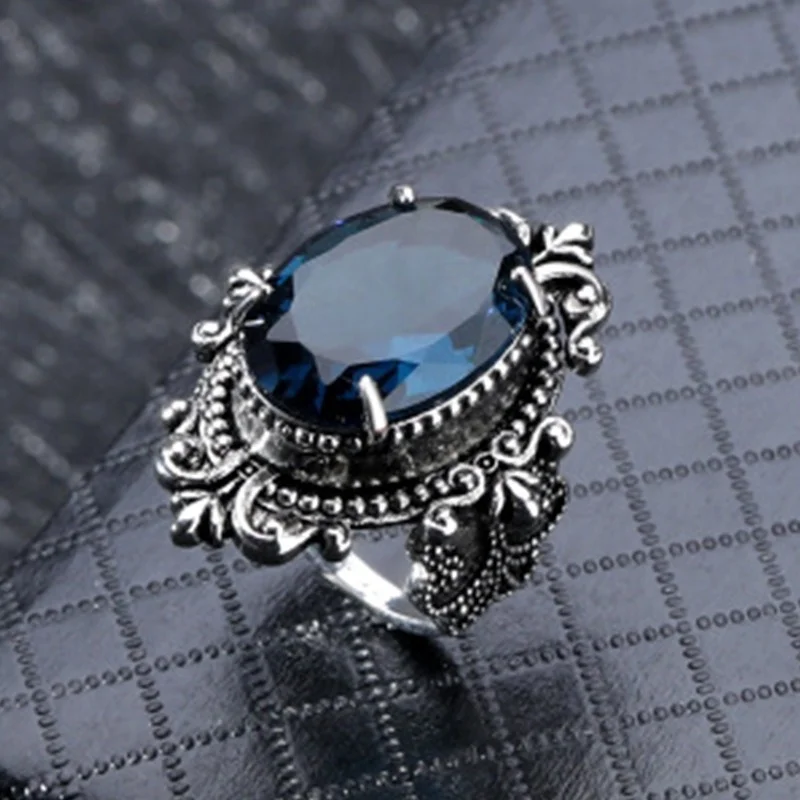 Sea blue topaz ring European and American retro Thai silver goose egg hand jewelry