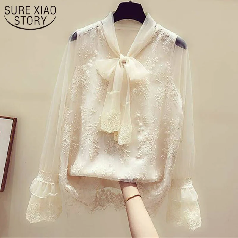 

2021 Bow Tie Korean Flare Sleeve Fashion Loose Embroidery O-neck Mesh Blouse Spring New White Lace Female Bottoming Shirt 12474