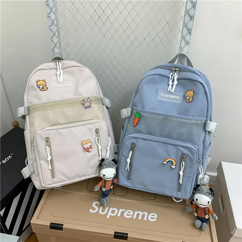 

2021 Summer Fashion Women's Backpack Pure Color Cute Badge Student School Bag Canvas Large Capacity Travel School Backpack